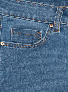蓝色牛仔裤。复古蓝色牛仔裤纹理细节口袋。口袋牛仔牛仔时尚背景