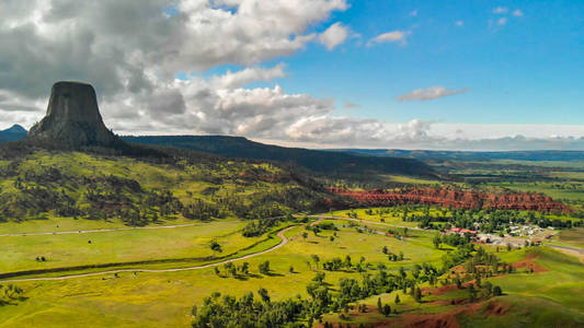 Aerial view of Devils Tower National Monument at summer sunset, 