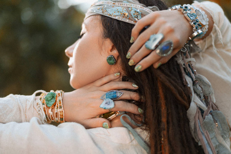 beautiful young stylish woman with boho accessories 