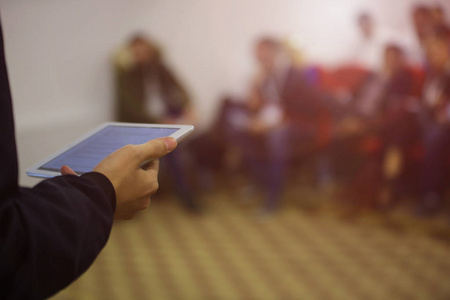 Businesspeople during business conference in conference room or 