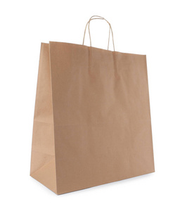 Empty craft paper bag isolated on white. Mockup for design