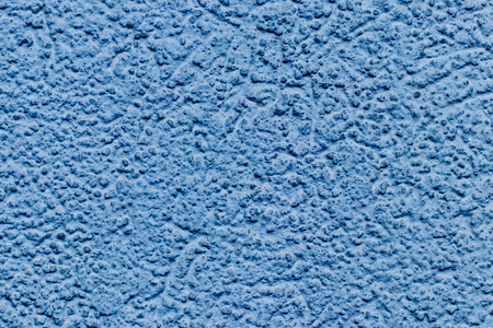 Texture of a blue stone wall. 