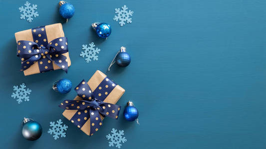 Elegant Christmas composition. Flat lay gift boxes with blue rib