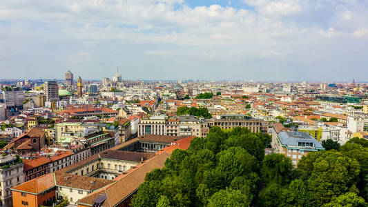 Milan, Italy. Roofs of the city aerial view. Cloudy weather, Aer