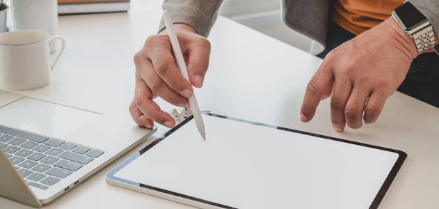 Closeup view of professional businessman writing his idea on bl