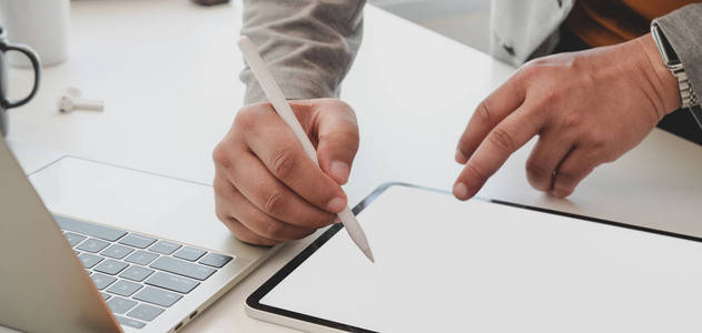 Closeup view of professional businessman writing his idea on bl