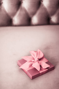 Vintage luxury holiday blush pink gift box with silk ribbon and 