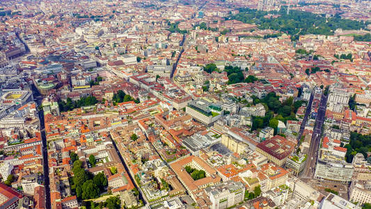 Milan, Italy. Roofs of the city aerial view. Cloudy weather, Aer