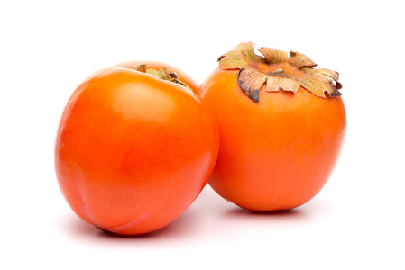 Persimmon fruits on white 