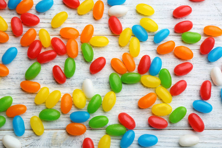米色背景的彩色甜果冻豆照片 正版商用图片25ga0l 摄图新视界