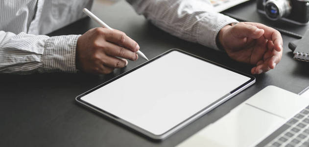 Cropped shot of professional businessman working on his project 