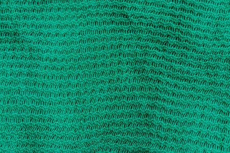 绿色针织质感。针织布背景