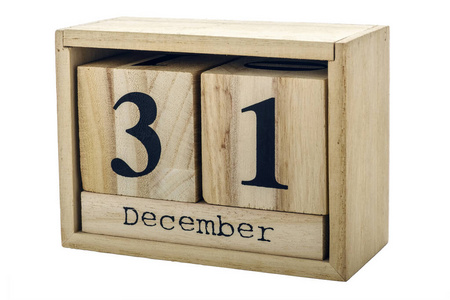 规划师用木方数字,十二月三十一日,冬日隔离在白色上照片