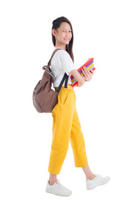 Full length of Beautiful asian teenage girl holding books 