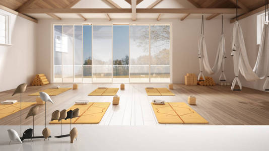 白色桌面或架子上有极简的小鸟装饰，空旷的瑜伽室上方有小鸟的小摆设，有垫子和配件的开放空间，随时可以进行瑜伽练习，冥想室