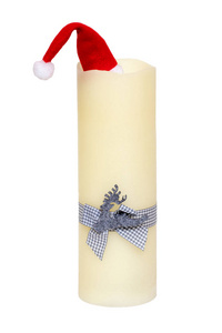 Christmas decorations isolated. Closeup of a large white candle 