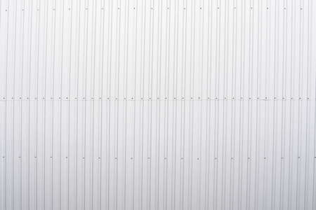白色波纹金属板纹理墙面.镀锌钢背景.照片