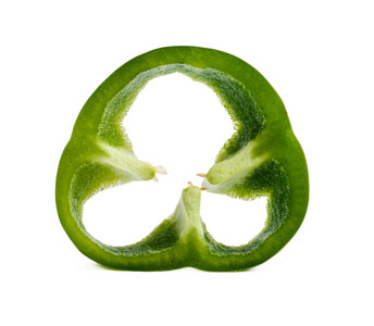 round section of green pepper in a cut, closeup, isolated on a 