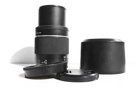 SLR telephoto lens and accessories  lens hood, cap 