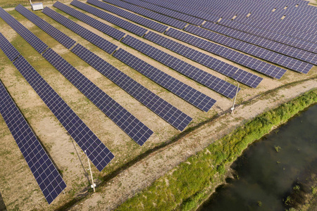 Aerial view of solar power plant. Electric panels for producing 