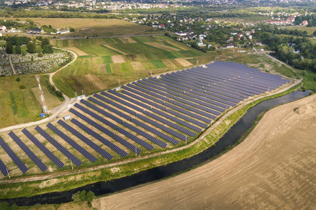 Aerial view of solar power plant. Electric panels for producing 