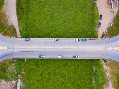 Aerial top view of bridge road over river automobile traffic of 