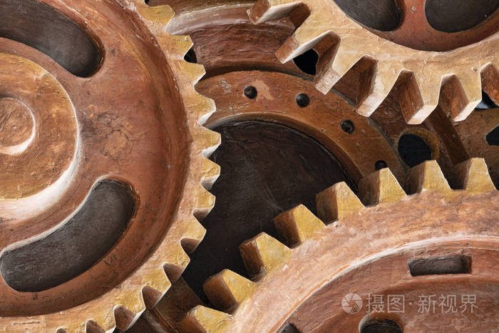 用生锈的旧齿轮雕刻的特写模式