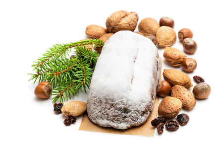 Traditional Christmas stollen fruit cake isolated on white 