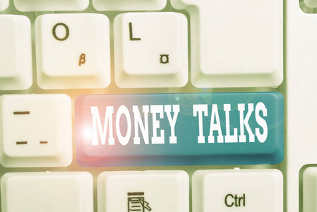 手写文字写钱说话 概念意味着财富给拥有它的人力量和影响力白色电脑键盘上面有空白的笔记纸白色背景键复制空间 照片 正版商用图片26m8n2 摄图新视界