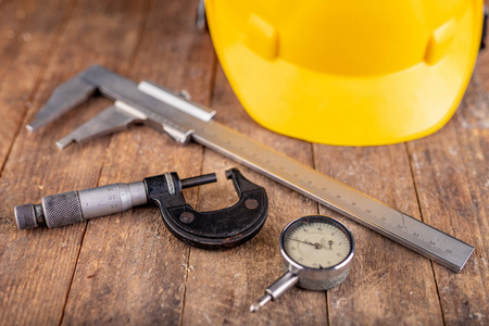 Protective helmet and measuring tools. 