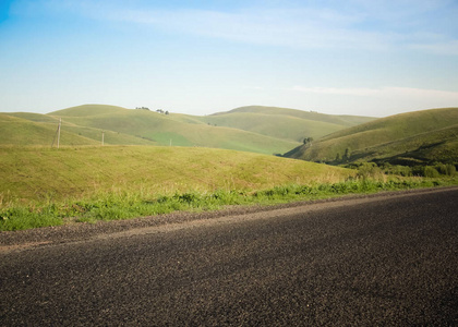 Empty Road and Nature of countryside with green hills