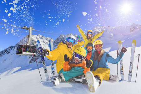 Happy family enjoying winter vacations in mountains . Ski, Sun, 