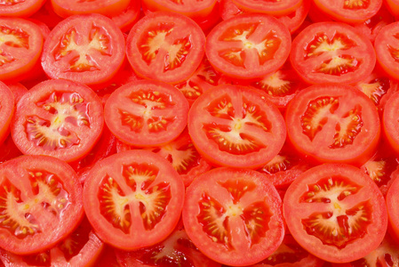 Sliced tomato background. Top view. 