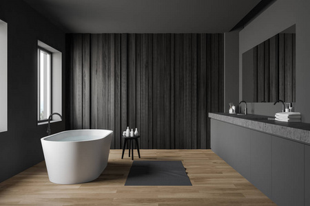 灰色和深色木制浴室，带水槽和浴缸