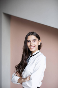 Studio portrait of smiling positive business woman. 