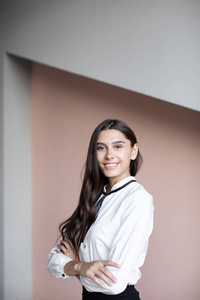 Studio portrait of smiling positive business woman. 