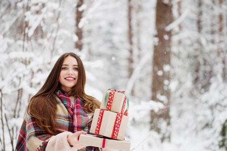 beautiful girl in winter forest 