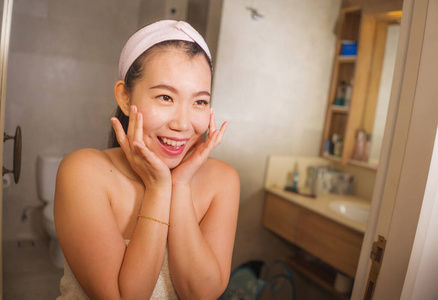 domestic lifestyle portrait of young beautiful and happy Asian C