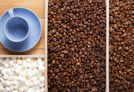 coffee beans in wooden plank box 