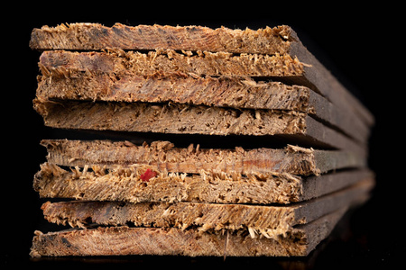 Raw wooden boards. Heavily jagged wood edges. 