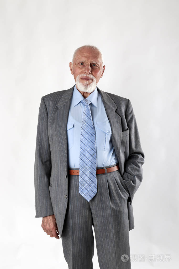 old man looking at the camera.