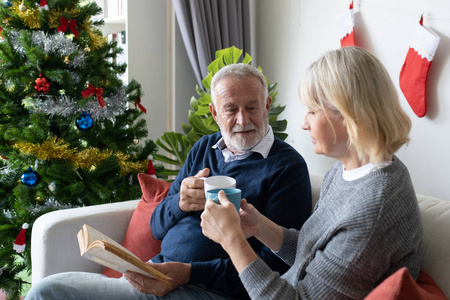 senior elderly caucasian old man and woman drinking coffee with 