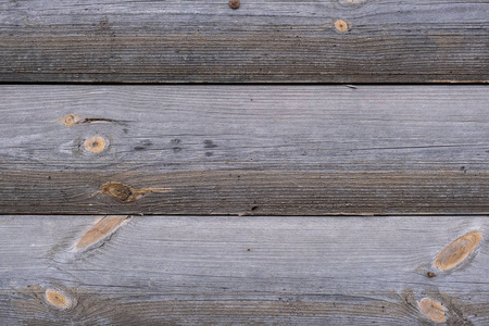 Round Log wall, old wood background. wall of wooden planks 