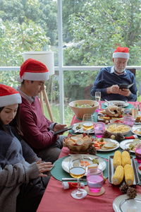 man and woman with family, using text message with mobile phone 