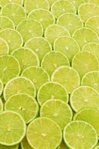 Fresh lime slices as a background. 