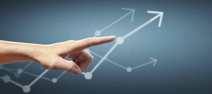 Hand touching a graphs of financial indicator accounting market 