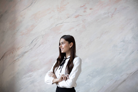 Studio portrait of smiling positive business woman. 