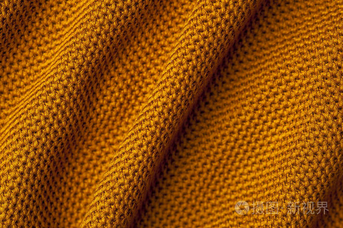 特写皱褶橙色针织物