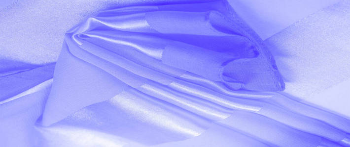 质地，背景，蓝色丝质条纹织物，带有金属光泽