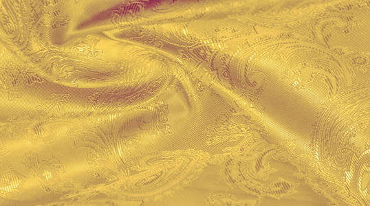 质地，背景，丝绸是黄色的。这个黄色的雄蕊